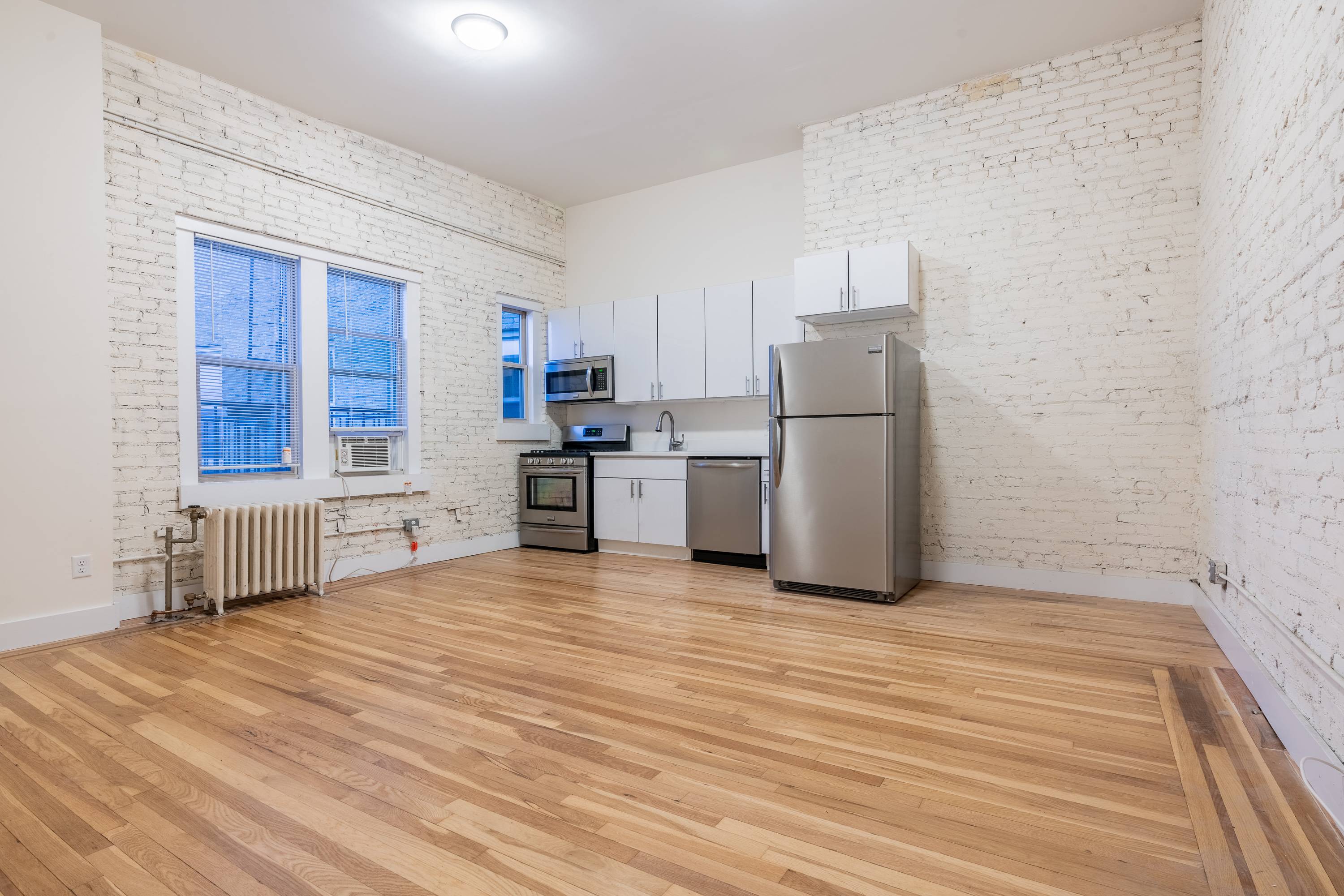 Stunning Loft Style 1 Bedroom Apartment minutes from Journal Square!  11ft Ceilings!  King Size Bedroom!  No Broker Fees!