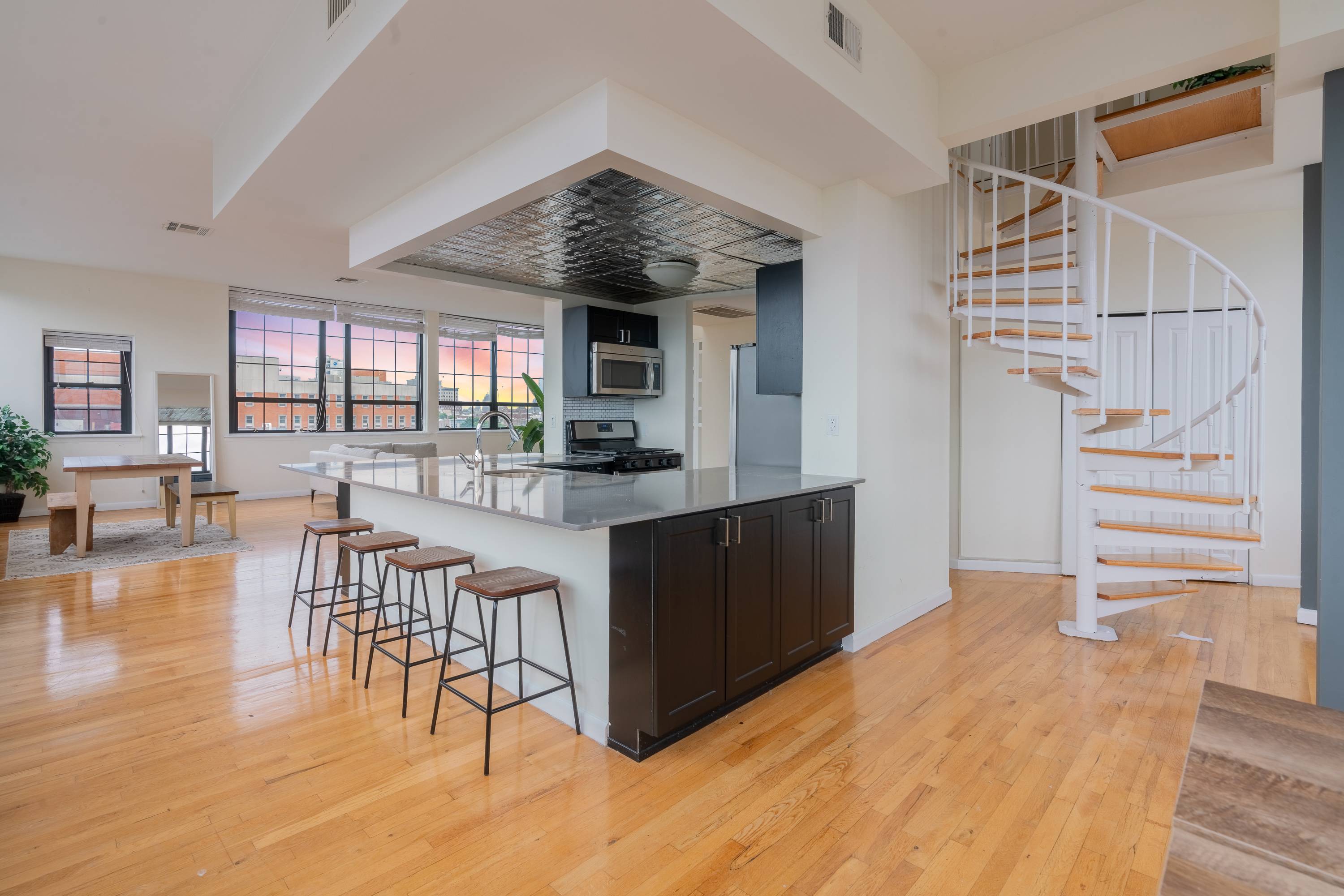 One of a Kind Glass House in the sky!  Stunning 1BR Duplex Soho-Style Loft located in Hoboken, NJ at the Grand Adams!  Washer/Dryer In Unit!