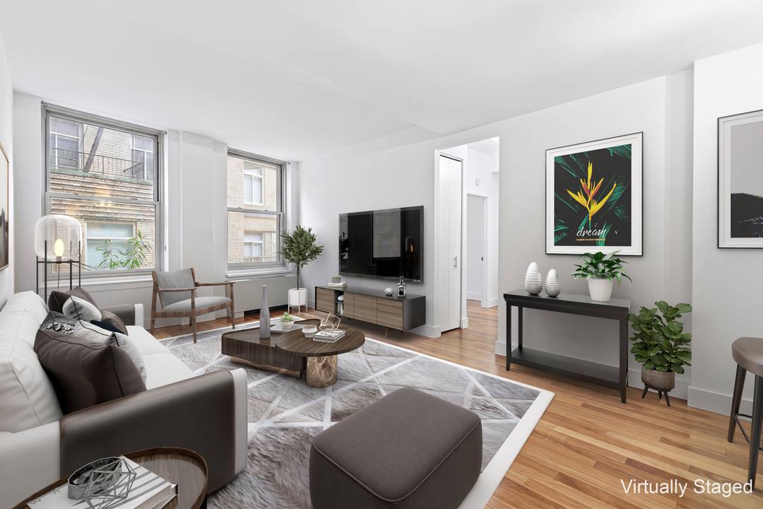 MUST SEE!! Beautifully renovated and move in ready corner 3 bedroom 2 bath condo in FIDI