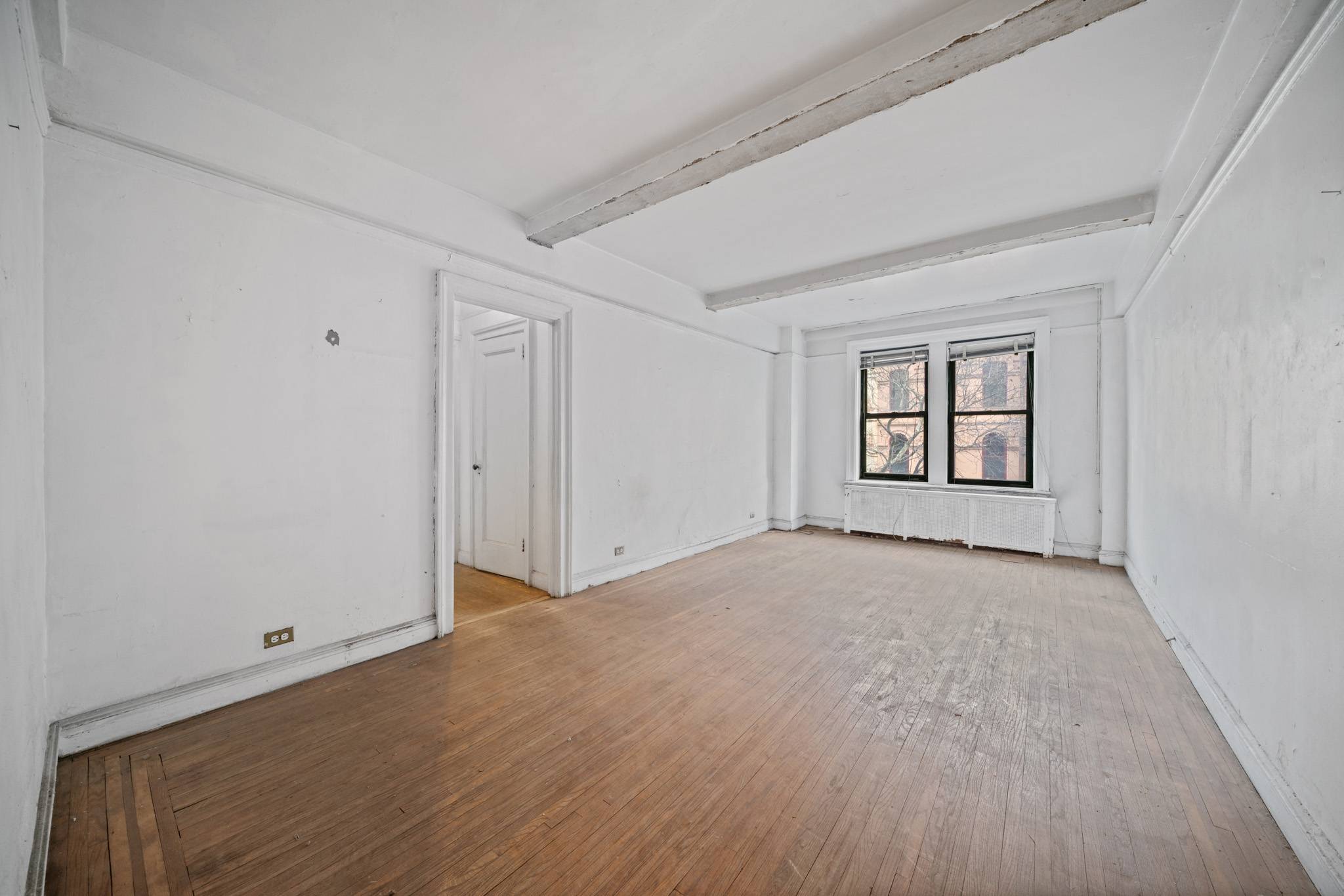 Spacious Pre-War 2BR/2BA Steps from Central Park – Bring Your Vision!