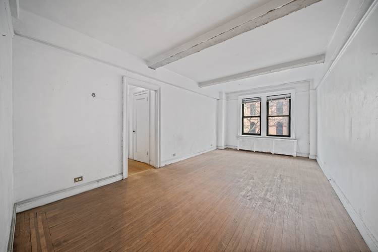 Spacious Pre-War 2BR/2BA Steps from Central Park – Bring Your Vision!