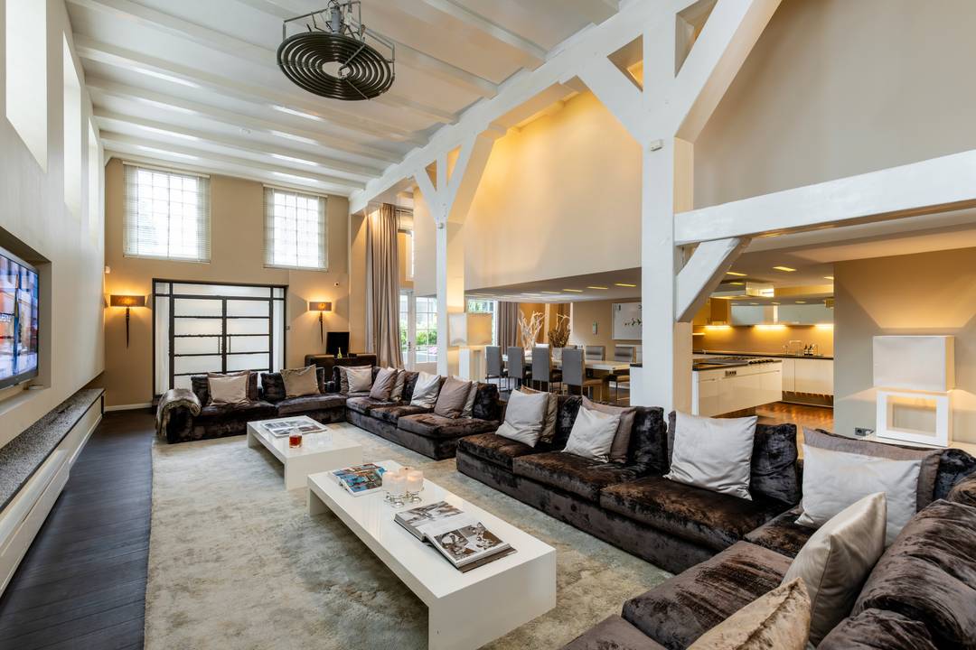 Exceptional approx. 330 m² canal loft in the Jordaan, with private city garden and indoor garage