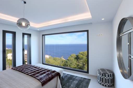 This immaculate villa with stunning sea views and beautifully presented is spread over two levels connected by internal stairs and an elevator.