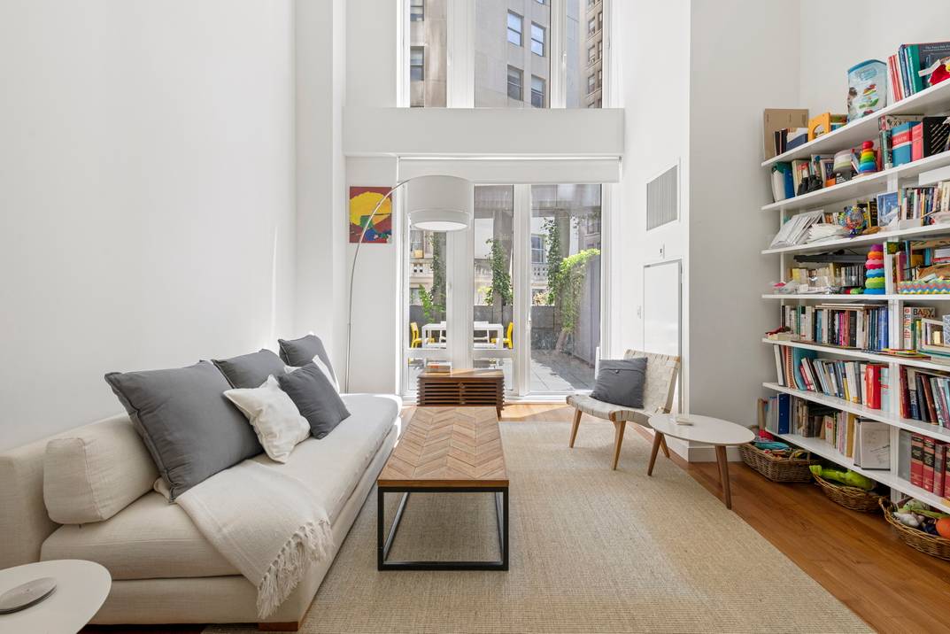 Duplex Residence with Private Outdoor Space and Unbeatable Amenities!