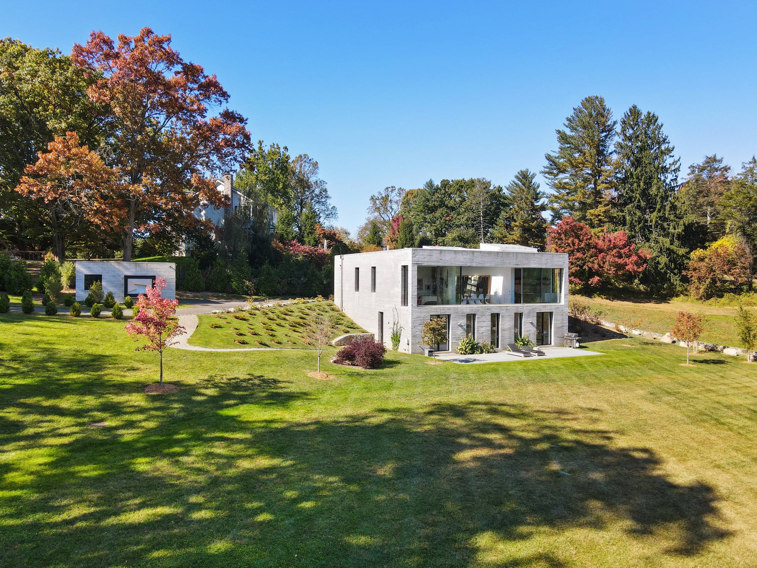 Modern Architectural Gem on 1.38 Acres, Surrounded by Protected Forest