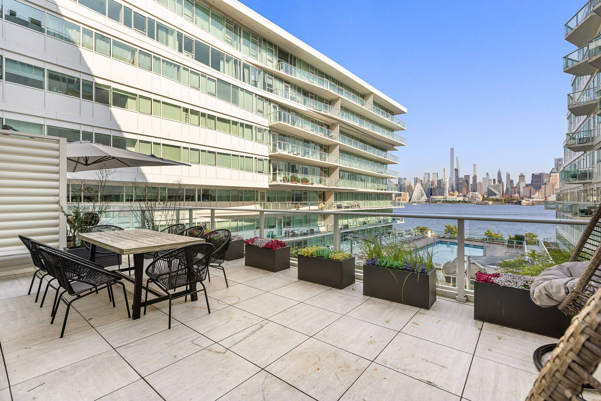 Waterfront Luxury Redefined: Private Terrace & Manhattan Views at The Avora’s Premier Residence