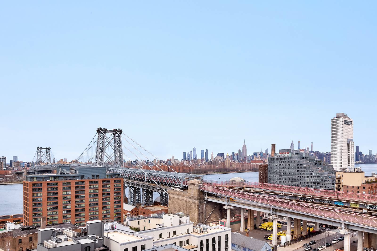 ICONIC WILLIAMSBURG LOFT WITH NYC SKYLINE & RIVER VIEWS