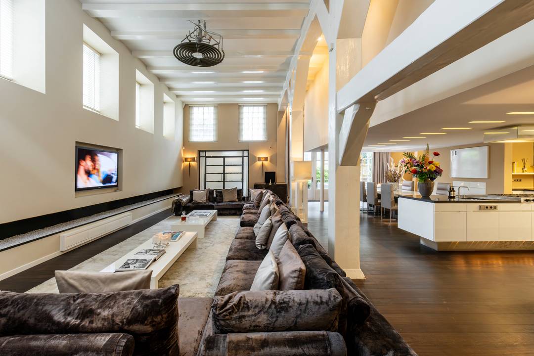 Exceptional approx. 330 m² canal loft in the Jordaan, with private city garden and indoor garage