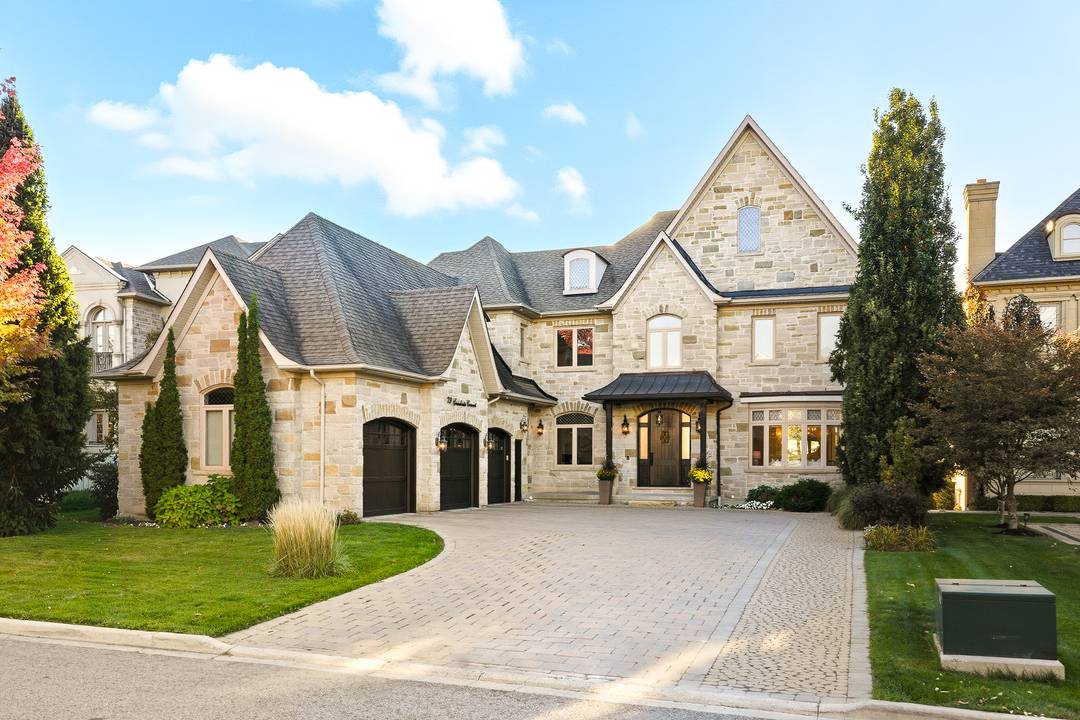 Set on a rare ravine lot on one of Woodbridge's most tightly held streets