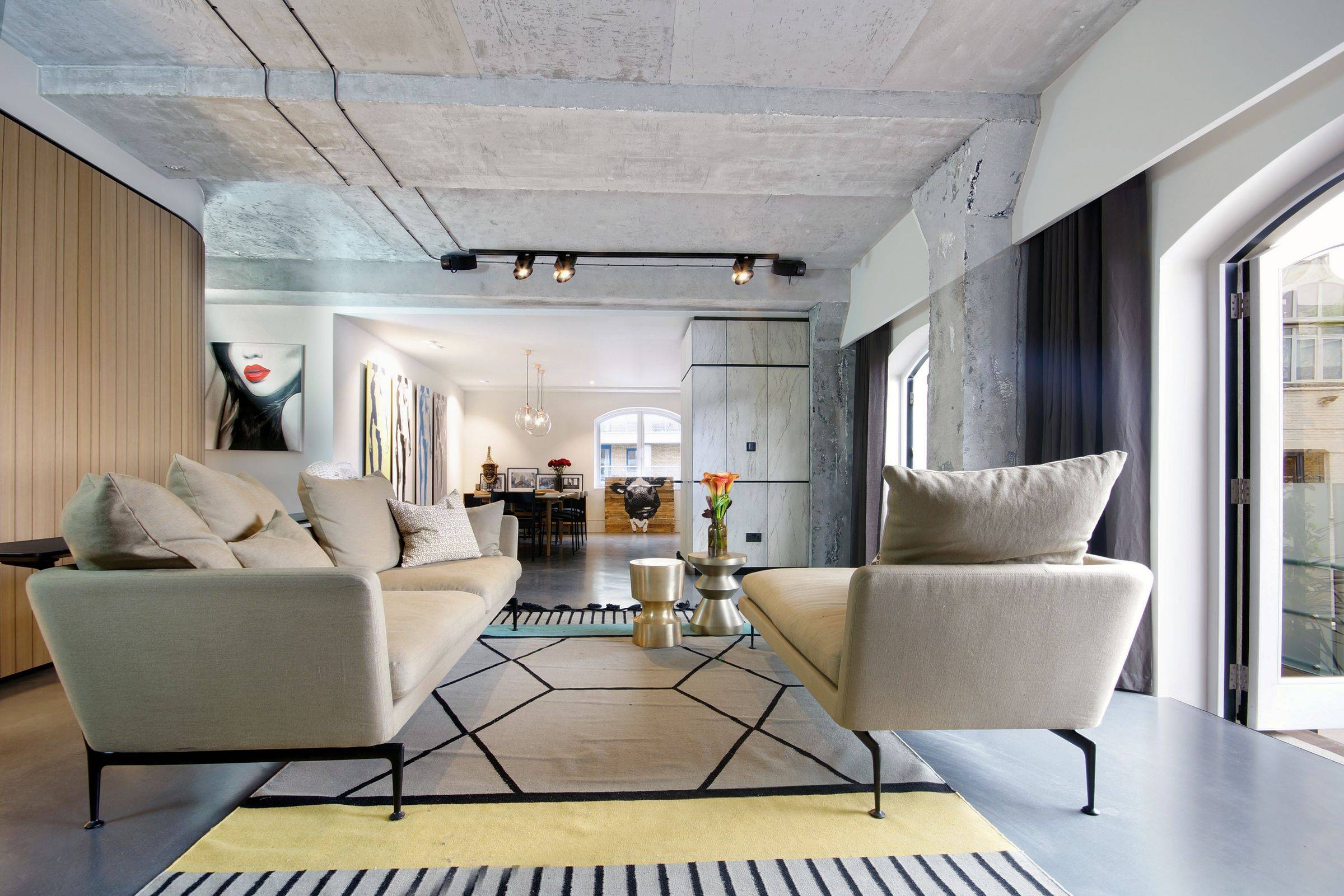 Three-bedroom lateral industrial style apartment occupying Victoria Beckham’s former design studio at this architecturally impressive converted industrial warehouse just around the corner from Battersea Park.