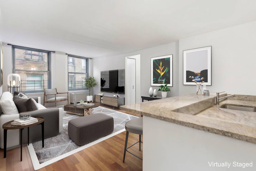MUST SEE!! Beautifully renovated and move in ready corner 3 bedroom 2 bath condo in FIDI