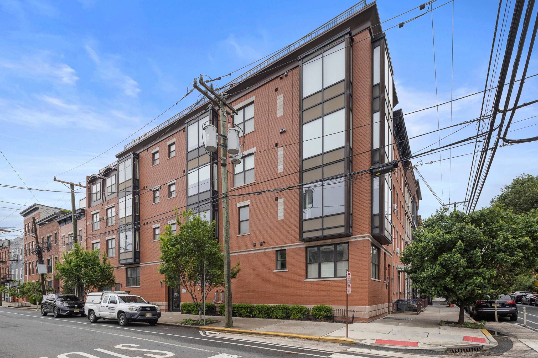 Luxury Townhome-Style Condo with Rooftop Oasis & Premium Parking in Downtown Jersey City!