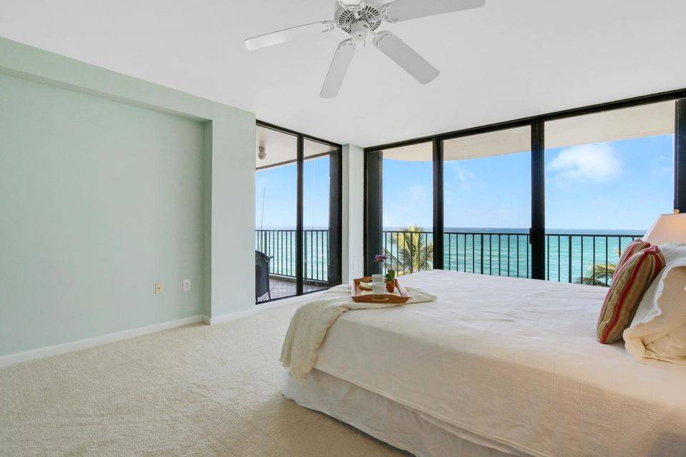 DIRECT OCEANFRONT ON JUPITER ISLAND; DESIRABLE END UNIT WITH WRAP AROUND TERRACE OVERLOOKING ATLANTIC OCEAN, POOL, LIGHTHOUSE AND INTER-COASTAL