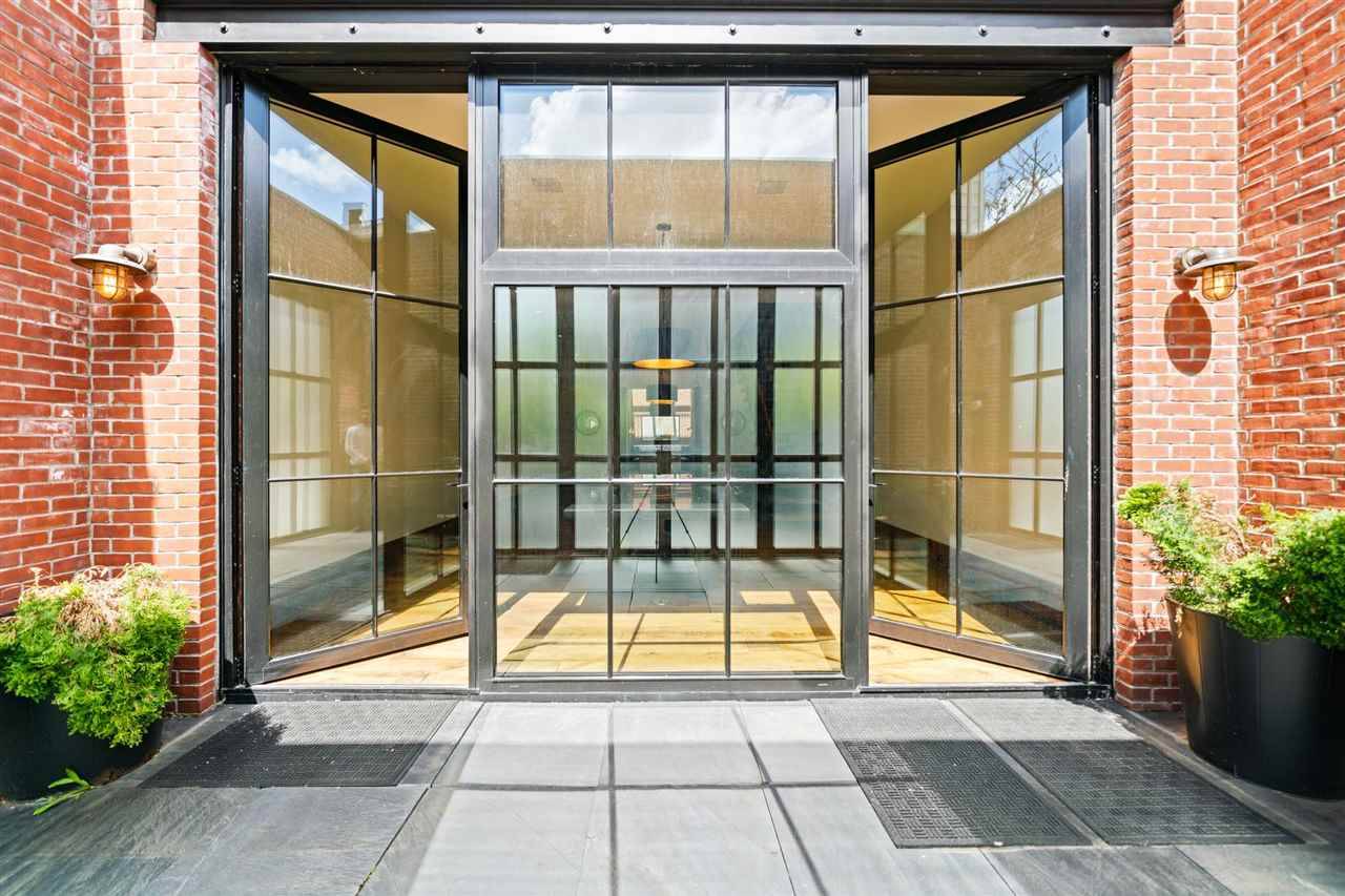 4 Bedrooms | 2.5 Bathrooms Brick Townhome designed by Architectural Digest's Top 100 Designer, Mitchell Turnbough