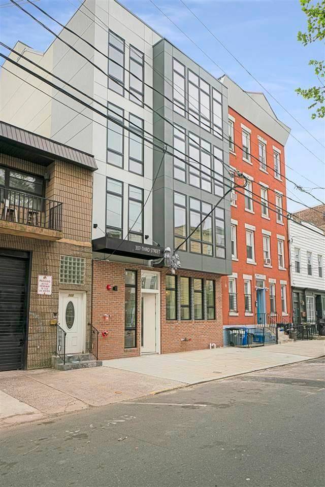 New Construction 1 Bedroom + Den in the Ideal Downtown Jersey City Location!