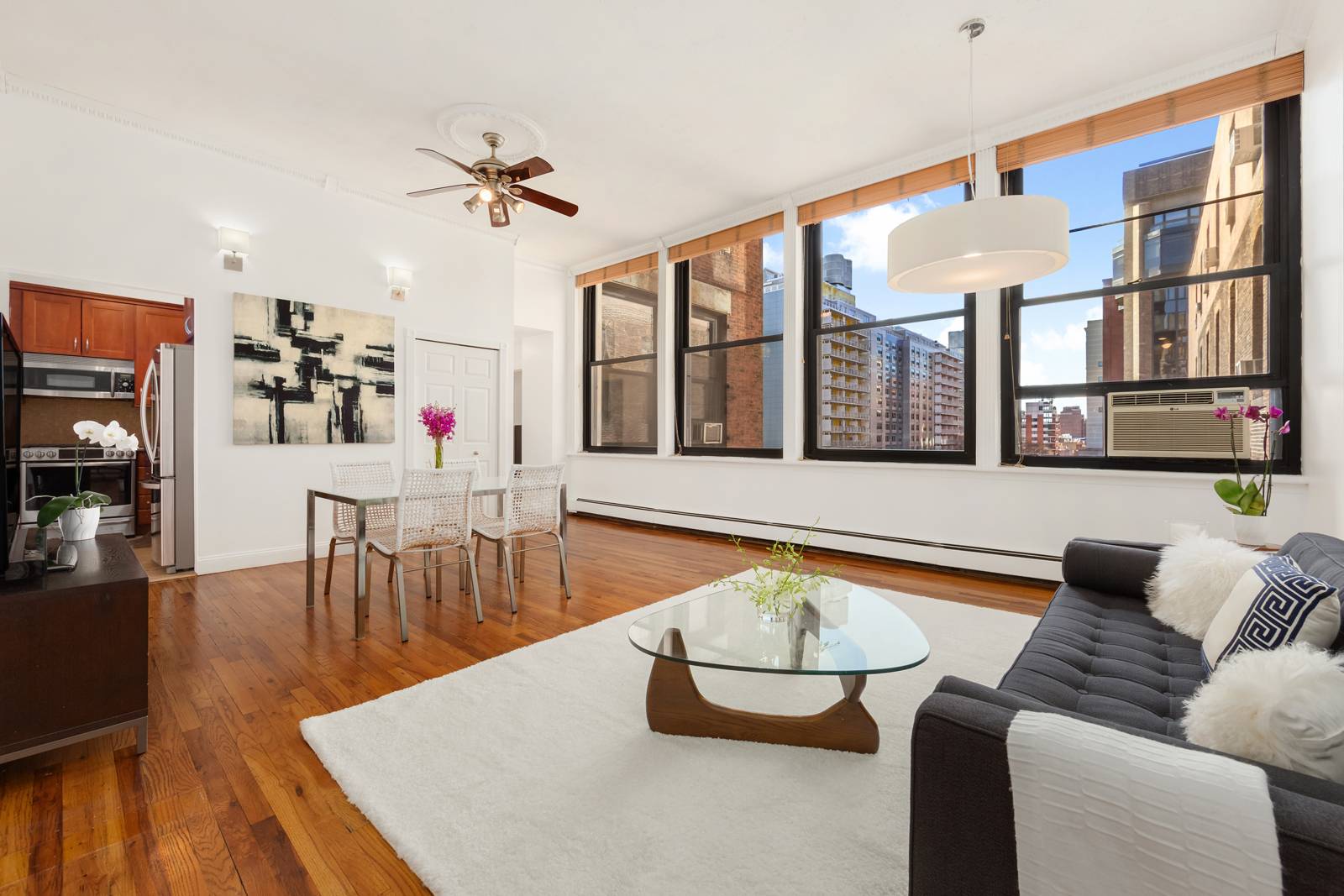 Loft Like One Bedroom Plus Home Office with a Wall of Windows in an Iconic Doorman Building in Greenwich Village/Noho