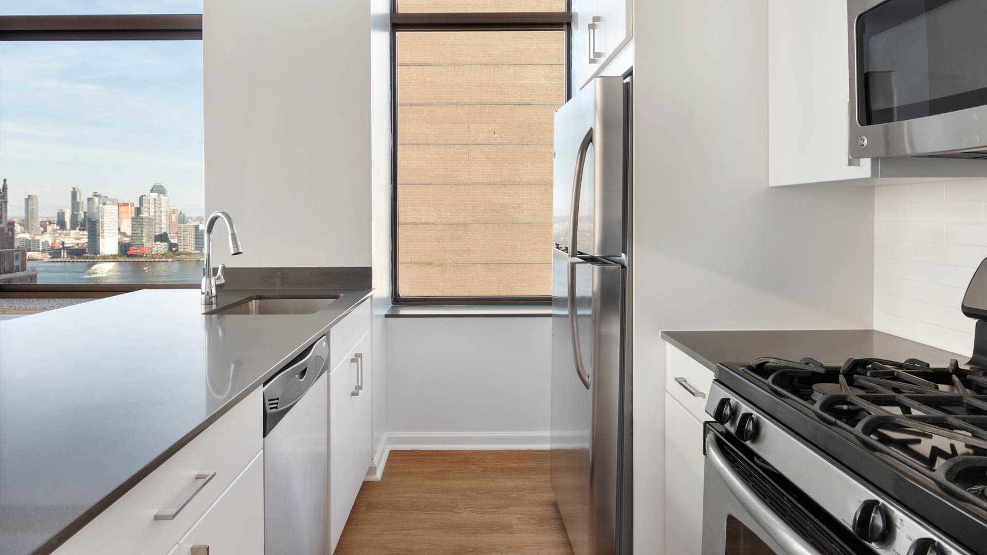 Floor to Ceiling Windows in this 2 Bed / 2 Bath in Murray Hill, W/D in unit