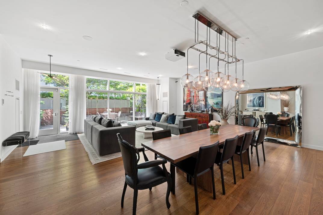 Beautiful SoHo Townhouse with Private Backyard and Condominium Amenities