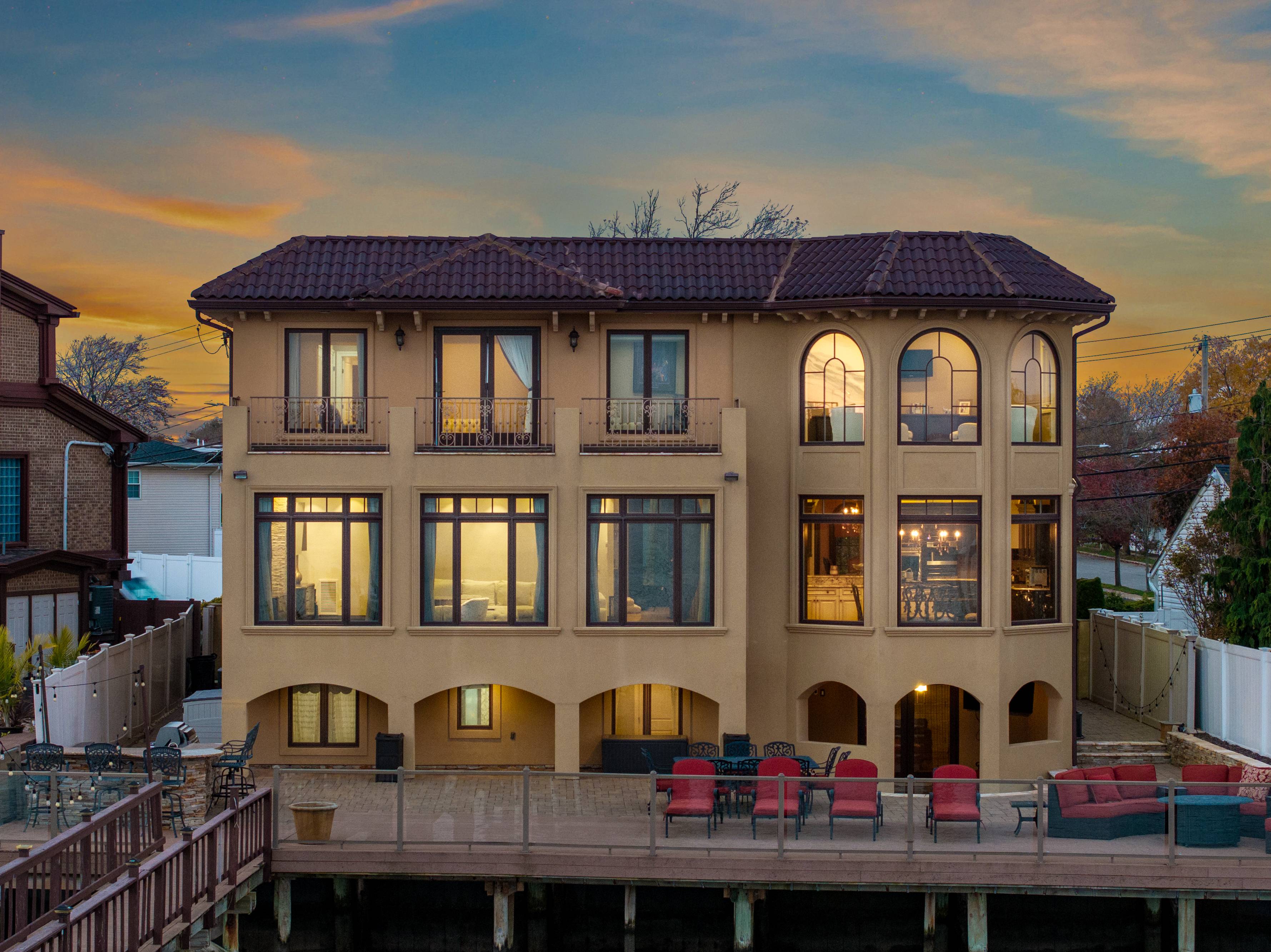 Mediterranean Waterfront Masterpiece in Merrick!