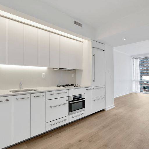 Amenity-Rich Philippe Starck Condo w/Empire State Building Views