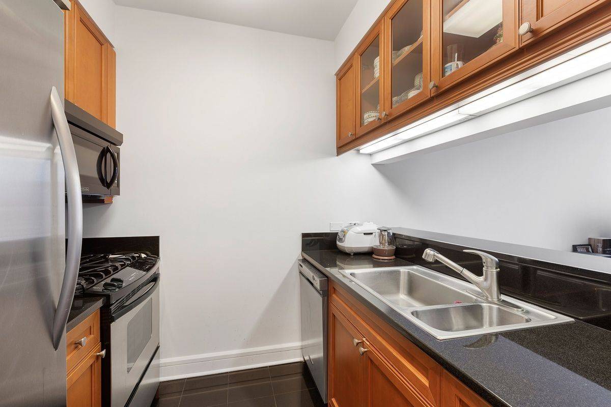 JUST LISTED! 905 SF 1 BEDROOM with Partial River Views!