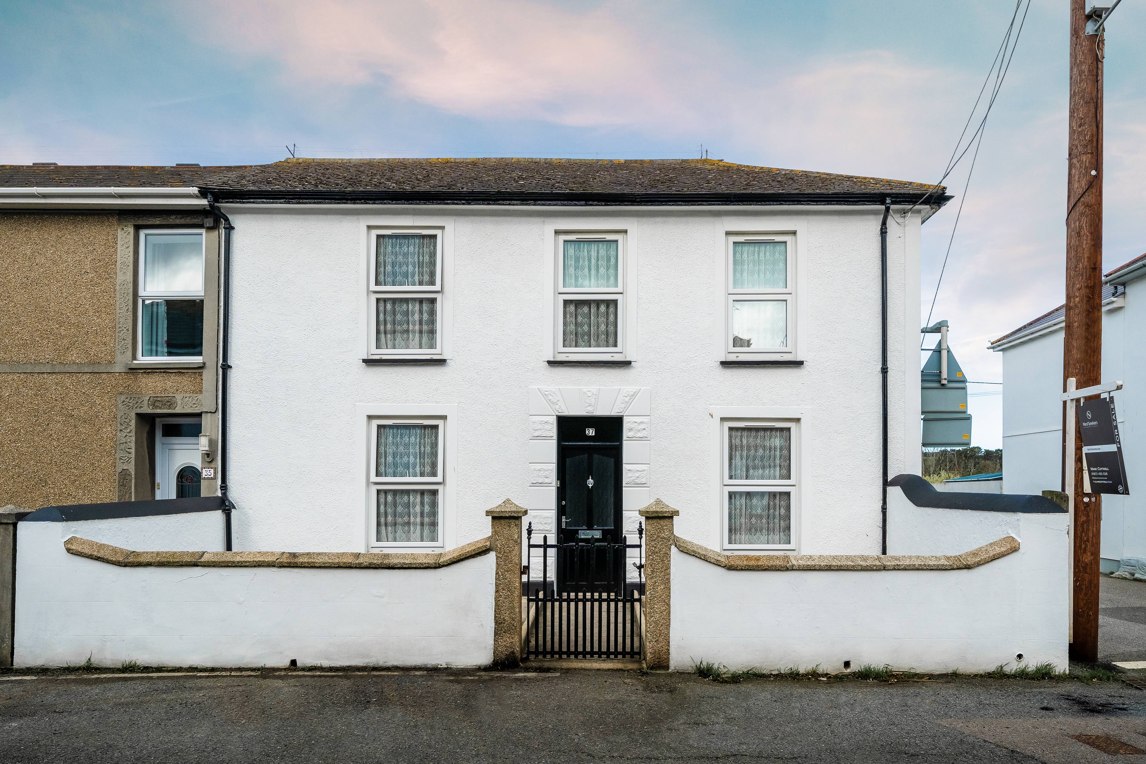 A Most Versatile Home With Income