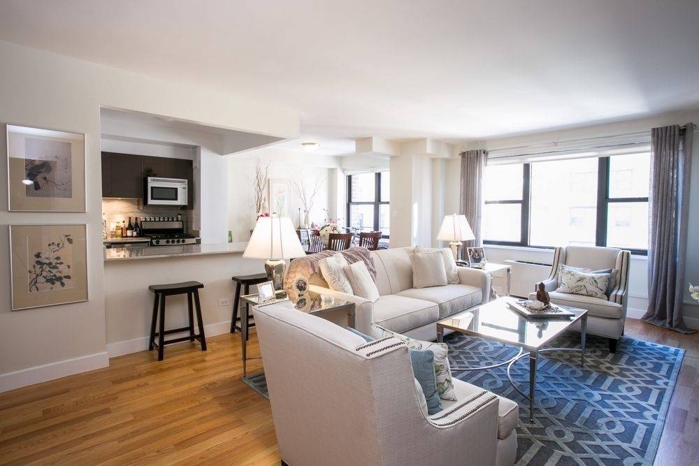 NO FEE! FULLY-RENOVATED, SPACIOUS HOME FEATURES STAINLESS STEEL APPLIANCES, MODERN BATHROOM, GREAT LIGHT AND AMPLE CLOSET SPACE
