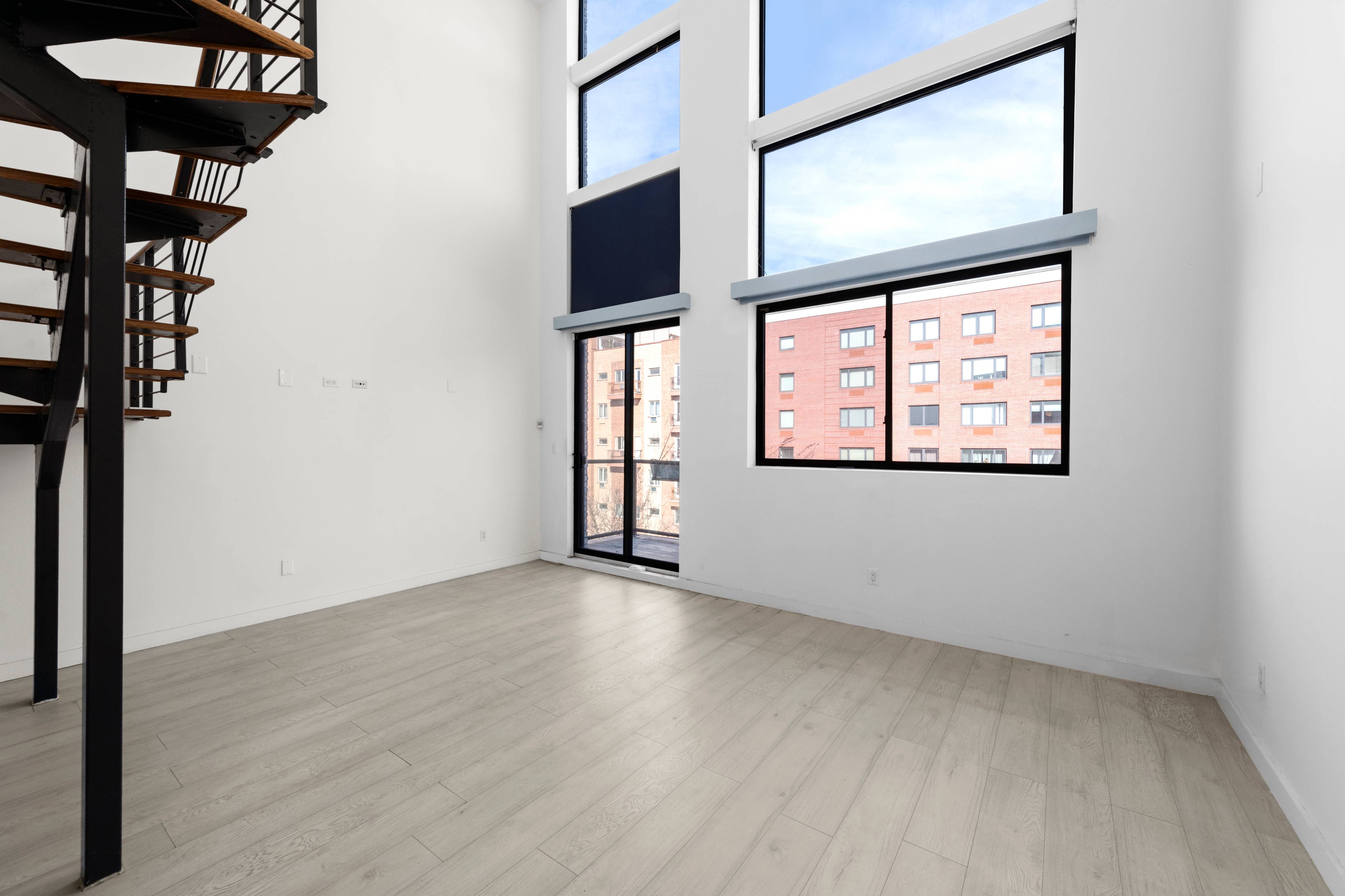 No fee Massive  3 bed/3 bath floor through duplex penthouse, in luxury Prospect Lefferts Garden building, featuring 20 ft living room ceilings