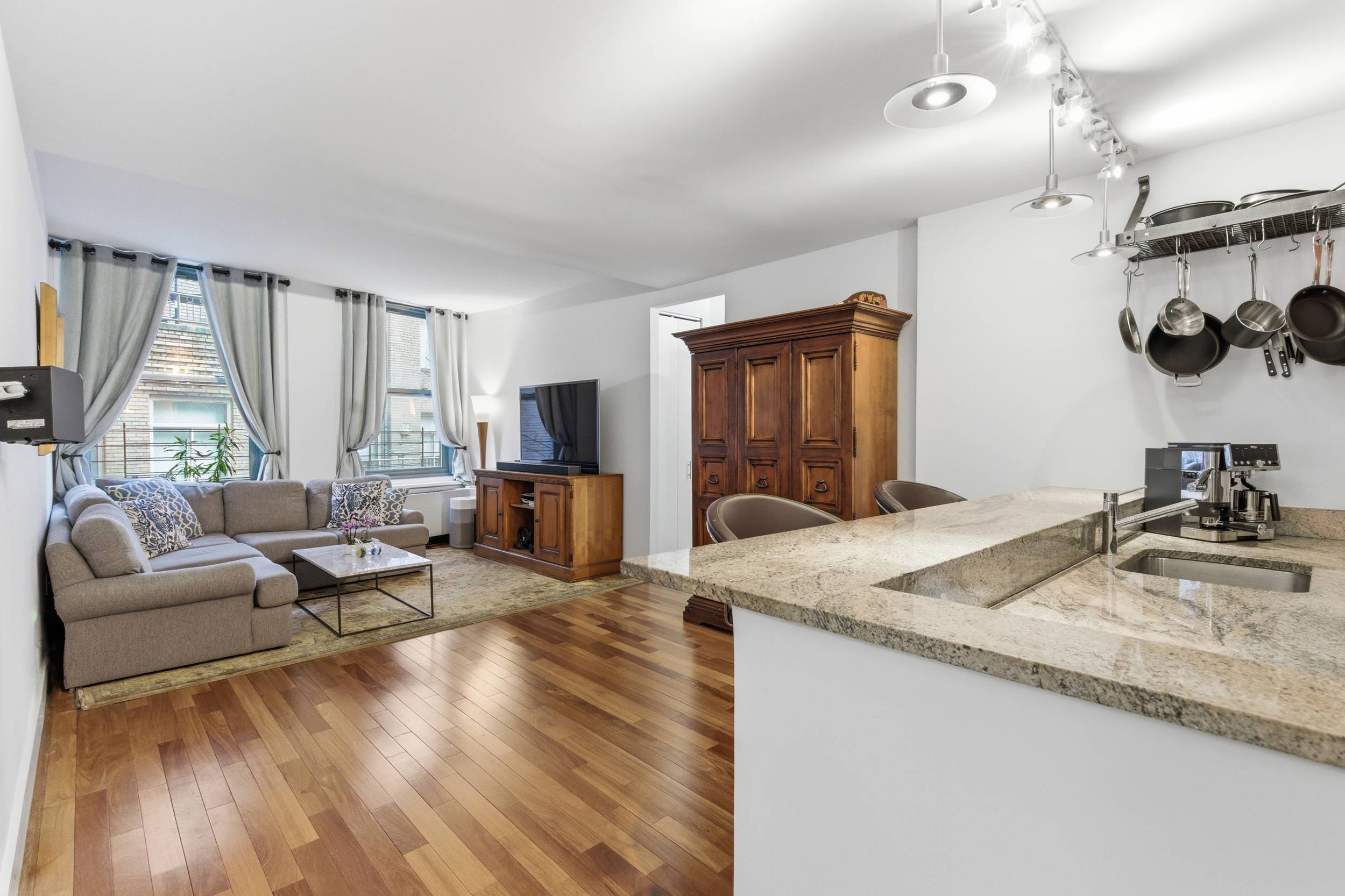 Beautifully renovated and move in ready corner 3 bedroom 2 bath condo in FIDI