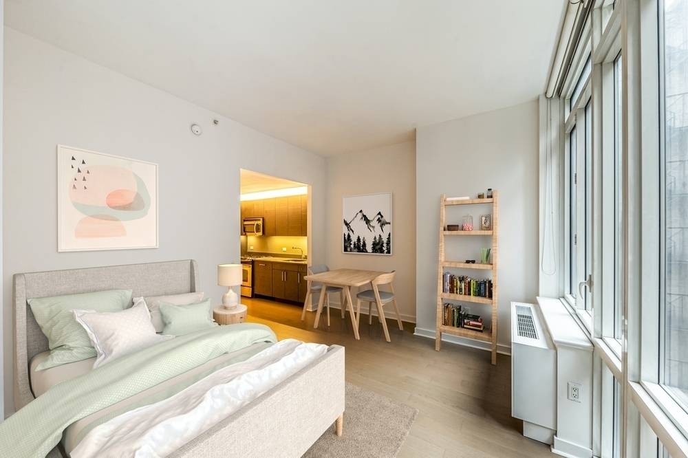 Stunning Murray Hill studio, floor to ceiling windows, W/D in unit!