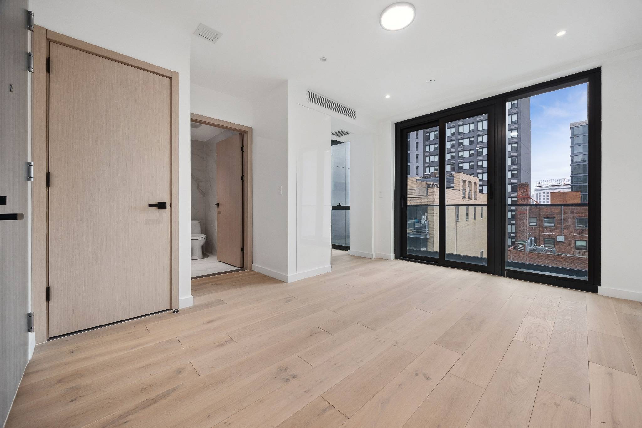 Sleek 1-Bedroom Condo in LIC | Private Balcony & Smart Home Features!