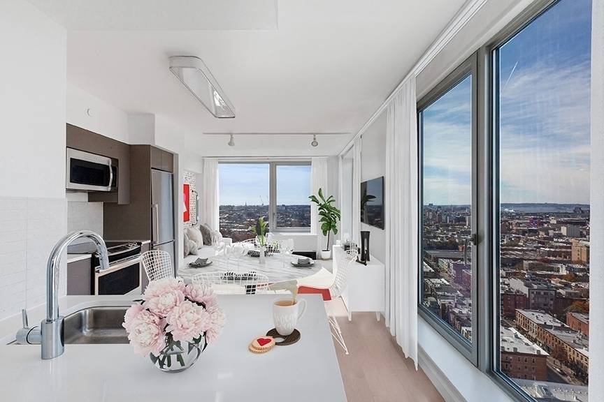 Luxury 1 BD/1BA in Downtown Brooklyn with Floor-to-Ceiling Windows, Light Modern Kitchen with Stone Countertops, W/D, No Fee