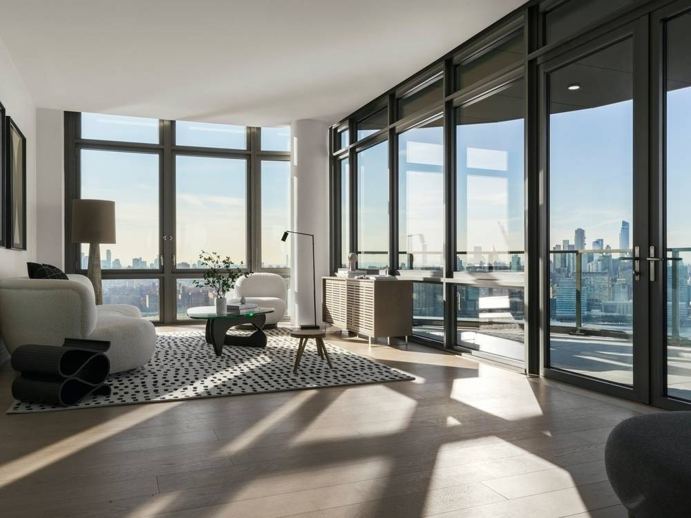 Sprawling 2 BD/2 BA with Breathtaking River & Manhattan Views, Terrace, 20ft Ceilings, Custom Features, W/D, No Fee