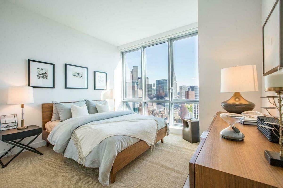 Premium NoMad 1 Bed with Stunning Midtown Views, Floor-to-Ceiling Windows, Kitchen Island, Bright White Kitchen, W/D, No Fee