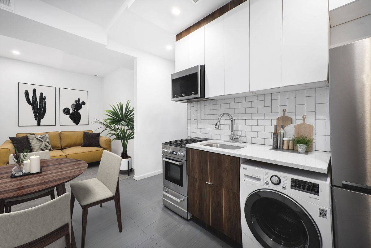 BRAND NEW 4 Bed + 2 Bath with Washer/Dryer in Unit + Private Outdoor Space
