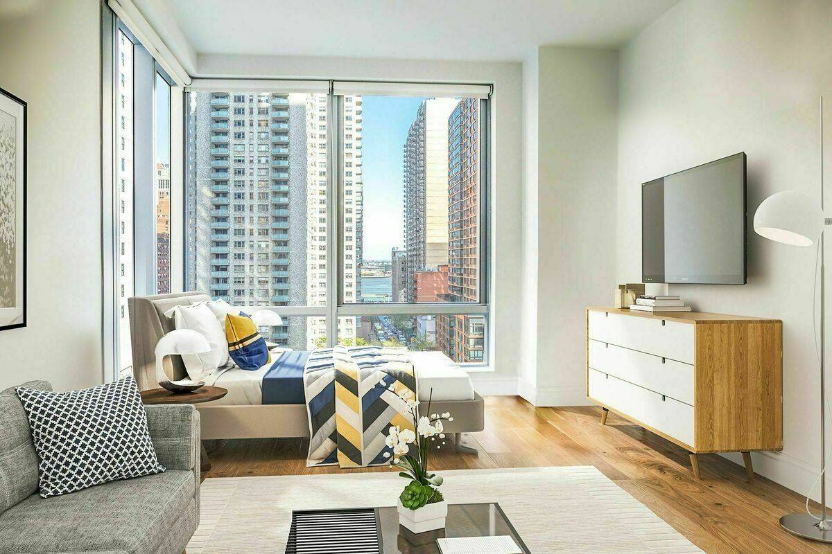 Midtown East Premium Corner Studio with Floor-to-Ceiling Windows, Chef's Kitchen, Rain Shower, W/D, Excellent Amenities, No Fee