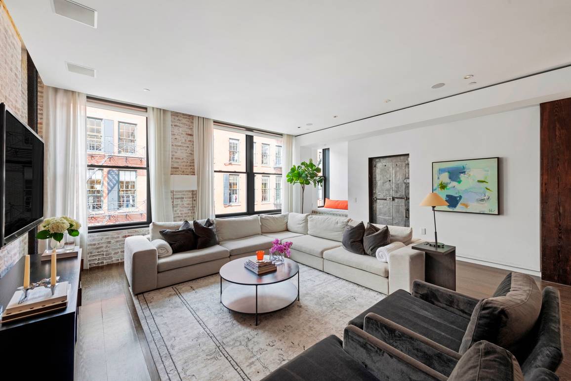 Mint Renovated Modern Two Bedroom Loft Plus Luxurious Home Office with Low Maintenance on Prime Soho Block