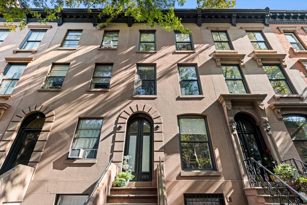 A one-of-a-kind two-family townhouse nestled in the heart of Cobble Hill.