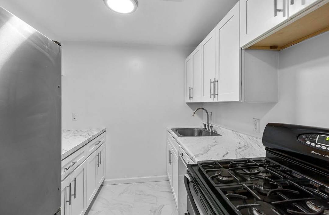 Exquisite triplex offers an abundance of space and sophistication, featuring three spacious bedrooms and 12 thoughtfully sized closets