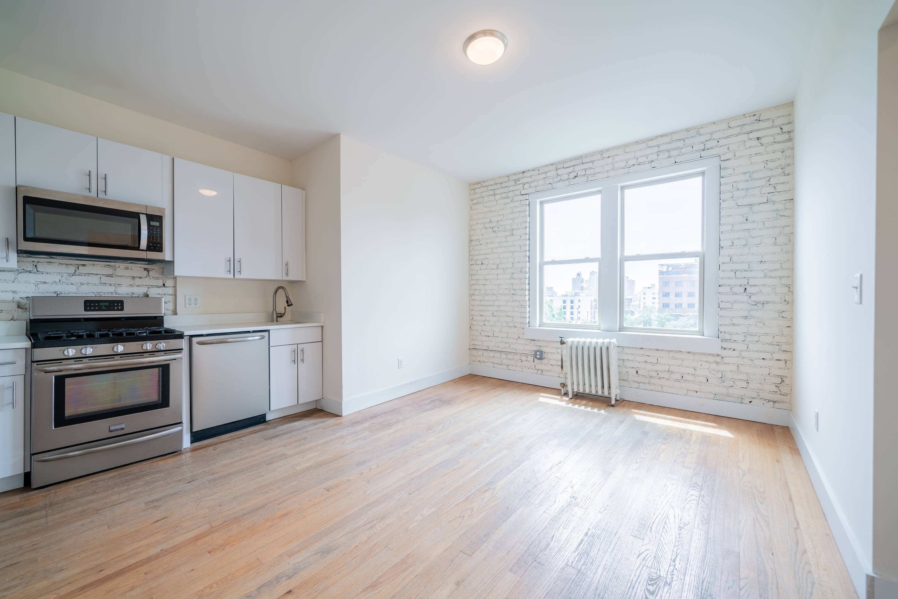1  BR- Stunning Renovated One Bedroom in Prime Journal Square Location!  Laundry on Site, Seconds to the Journal Square Path Transportation Center!