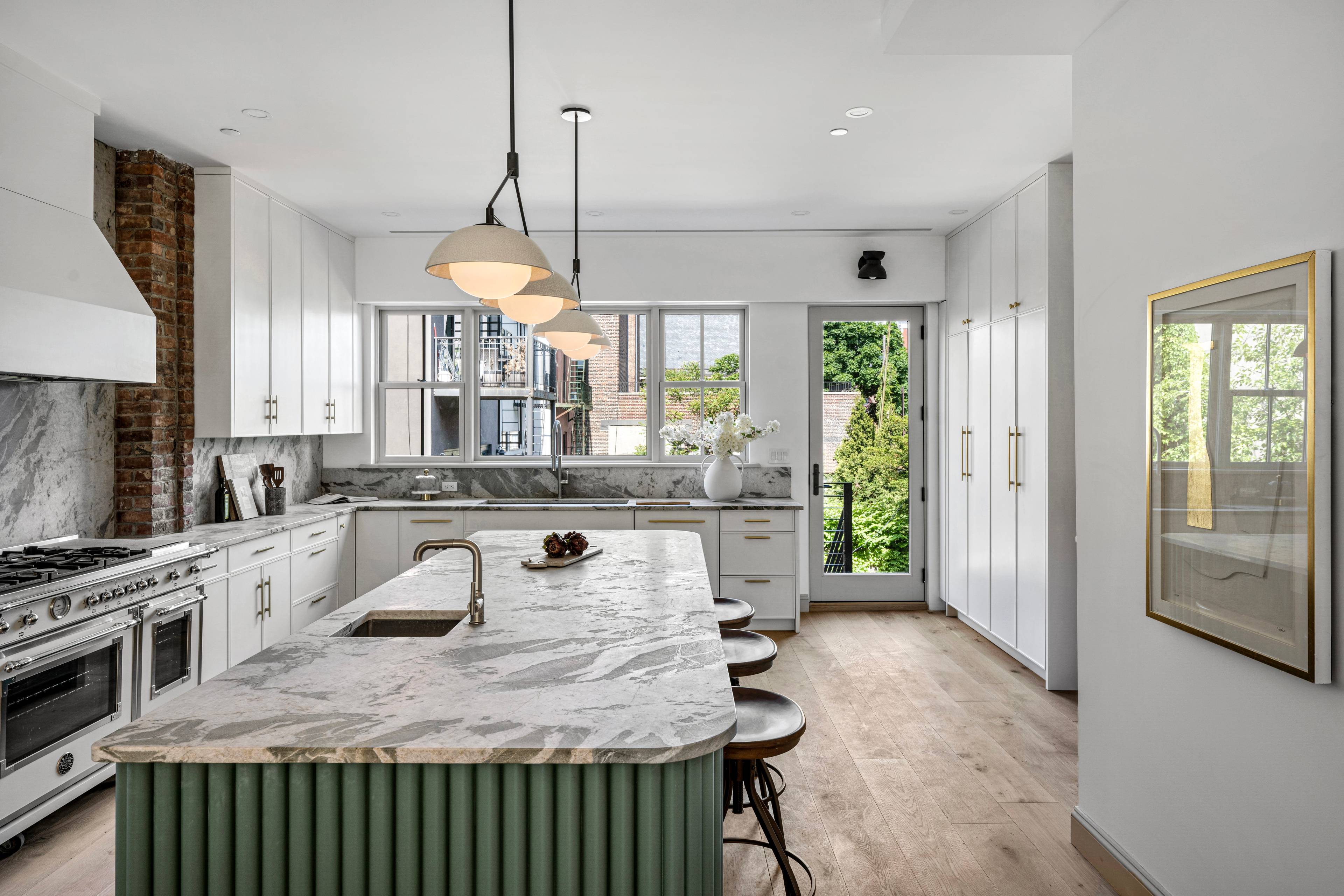 Designer townhouse boasting custom finishes and a prime Carroll Gardens location.
