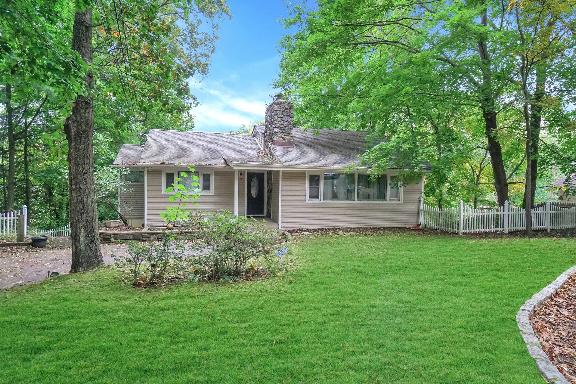 Rustic Expanded Ranch in Dix Hills