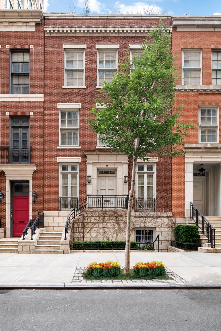 Stunning Designer Townhouse with Condo Amenities and Two Private Outdoor Spaces
