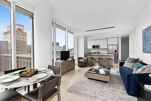 Steps from Central Park Premium Corner 2BD/2BA with Light Interiors, Condo Finishes, High Ceilings, Floor-to-Ceiling Windows with City Views, Breakfast Bar, Walk-in-Closet, In-unit W/D