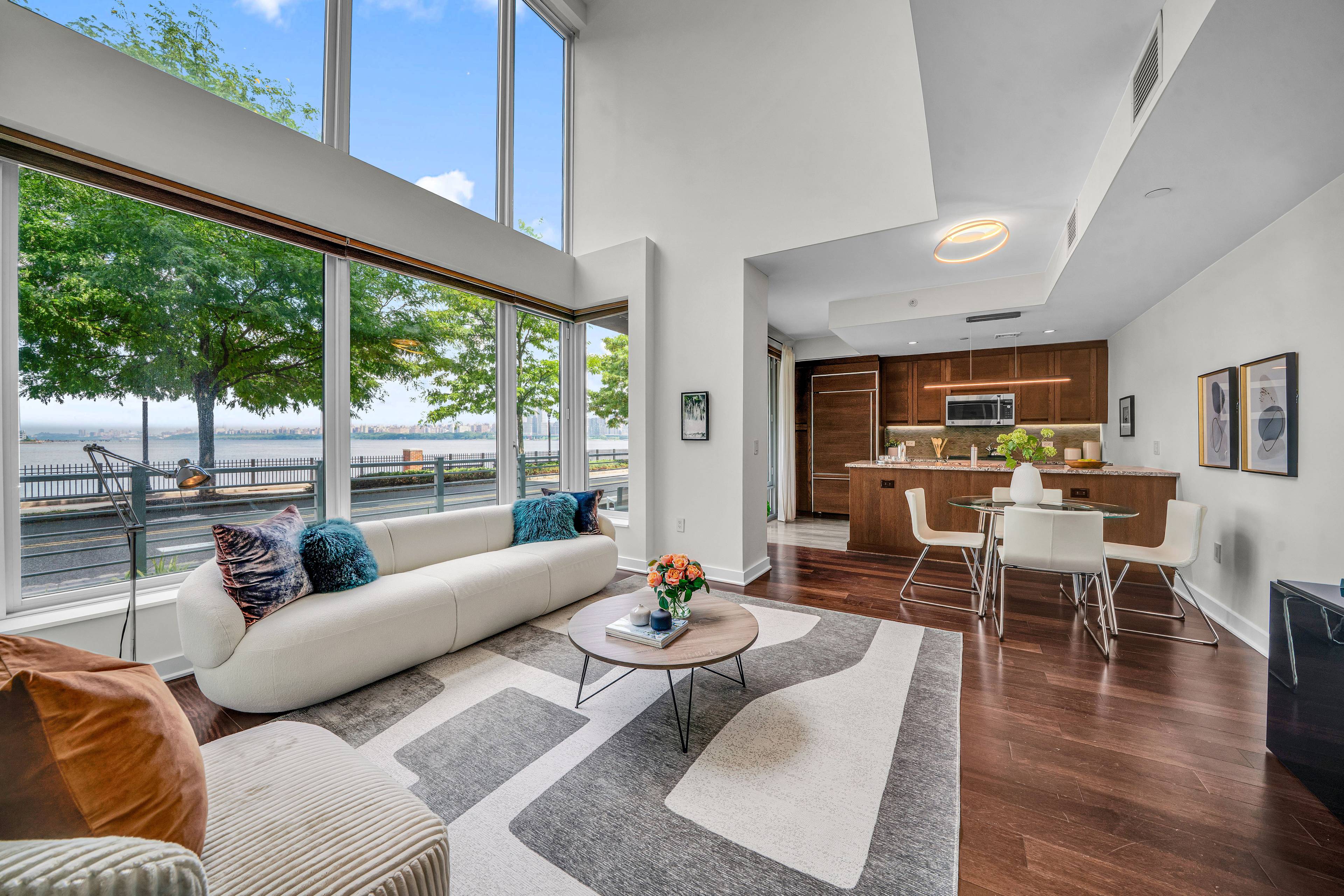 RARE TOWNHOUSE STYLE LIVING ON THE WEEHAWKEN WATERFRONT!