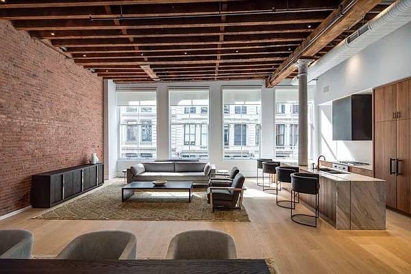 Oversized, Gut Renovated Loft consisting of 2 bedrooms plus a large den and 3 bathrooms spread over 3109 square feet.