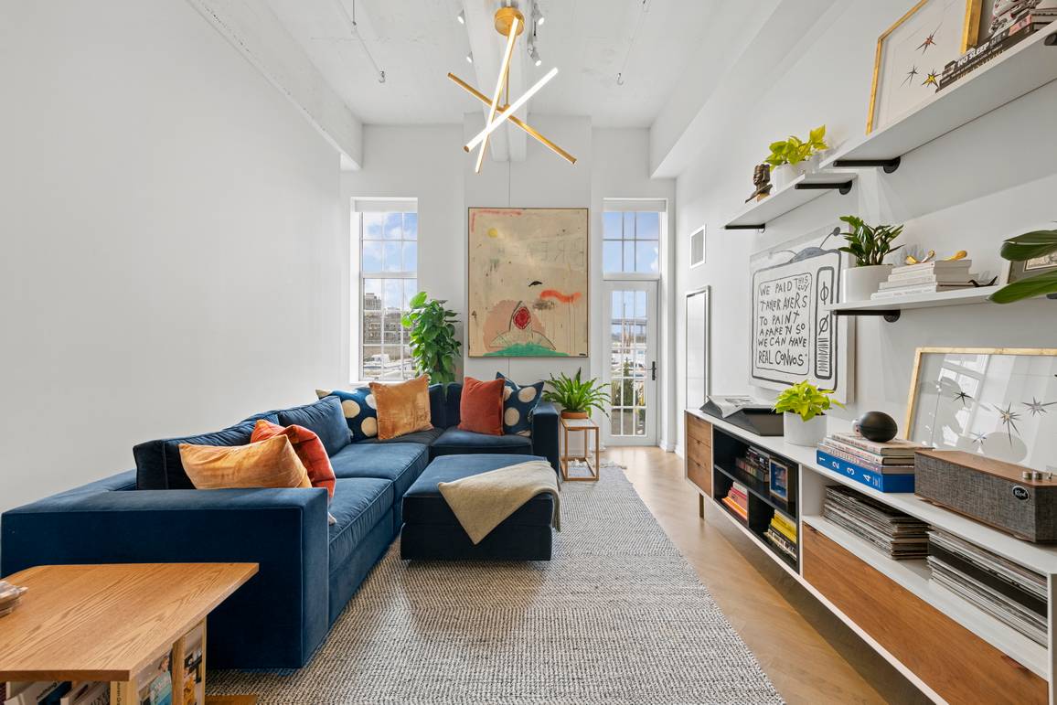 LUXURY WATERFRONT CONDO WITH PRIVATE OUTDOOR SPACE & NYC VIEWS