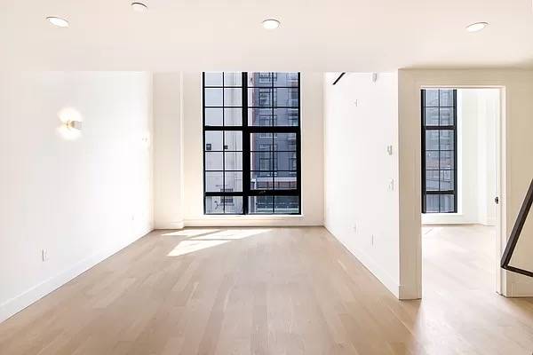 Stunning 1BR/1BA + HO in Luxurious Mott Haven New Development