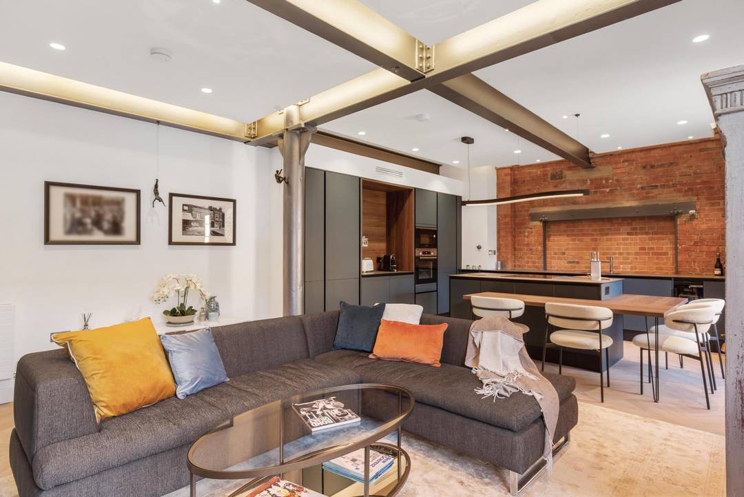 A RARE WAREHOUSE LOFT with 3m high Ceilings | Steel Beams| Balcony | Allocated Parking Space | Share of Freehold | Moments from Canary Wharf | Chain-Free Sale in a Fully Gated Development. Video Tour Available