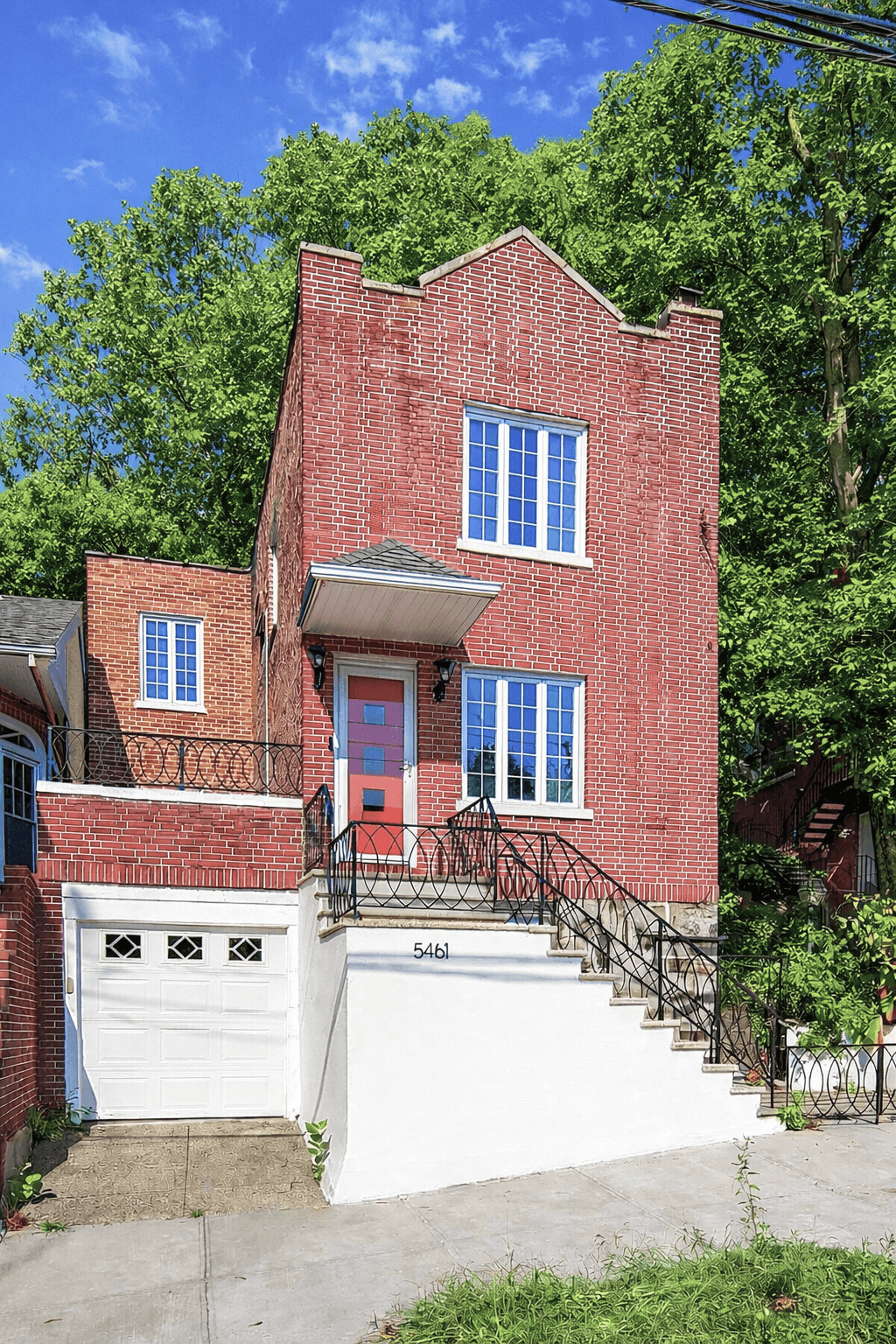 One-of-a-Kind Single-Family with Garage, Multiple Outdoor Spaces & Finished Basement in Riverdale